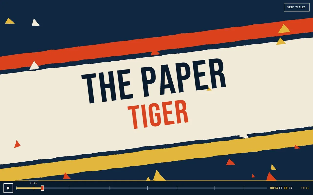 The words THE PAPER TIGER in bold condensed type on a tilted chalk band between orange and mustard stripes, with scattered paper triangles.